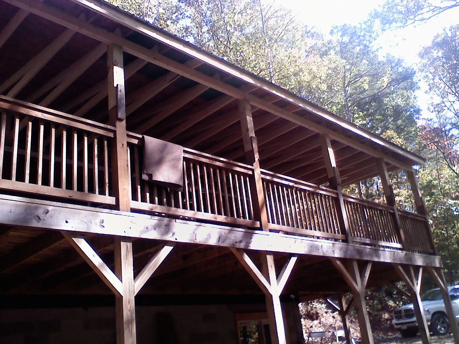 Timber framing under a new elevated porch and deck — Roof Leak Repair in Swayzee by Roofing Brothers